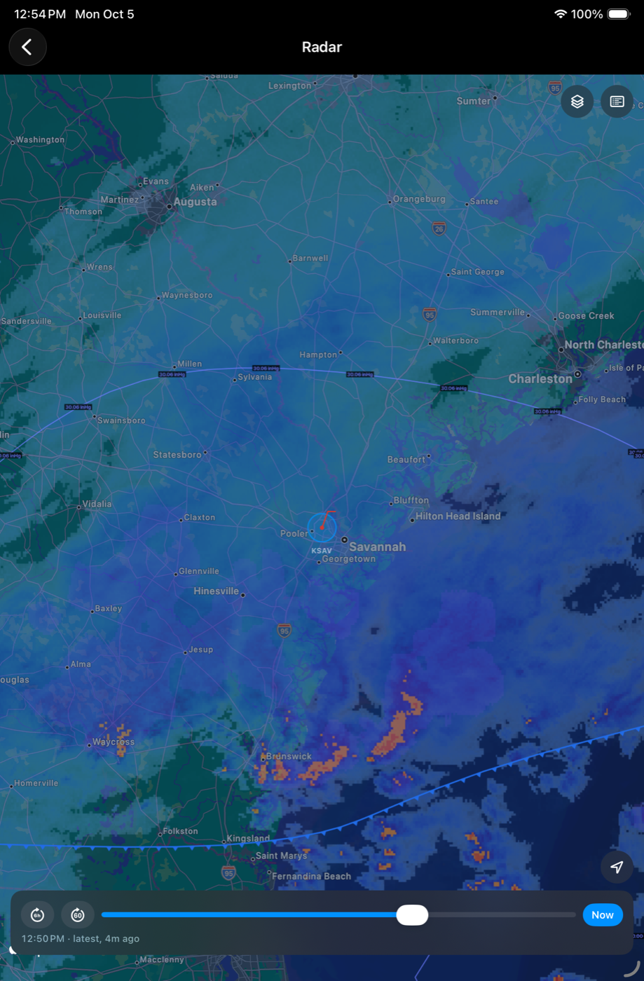 The radar with rain, fronts, pressure lines and lightning on one map, on an iPad in dark mode